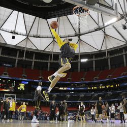 Wichita State's Fred Van Vleet works during practice for their NCAA Final Four tournament college basketball semifinal game against Louisville, Friday, April 5, 2013, in Atlanta. Wichita State plays Louisville in a semifinal game on Saturday. 