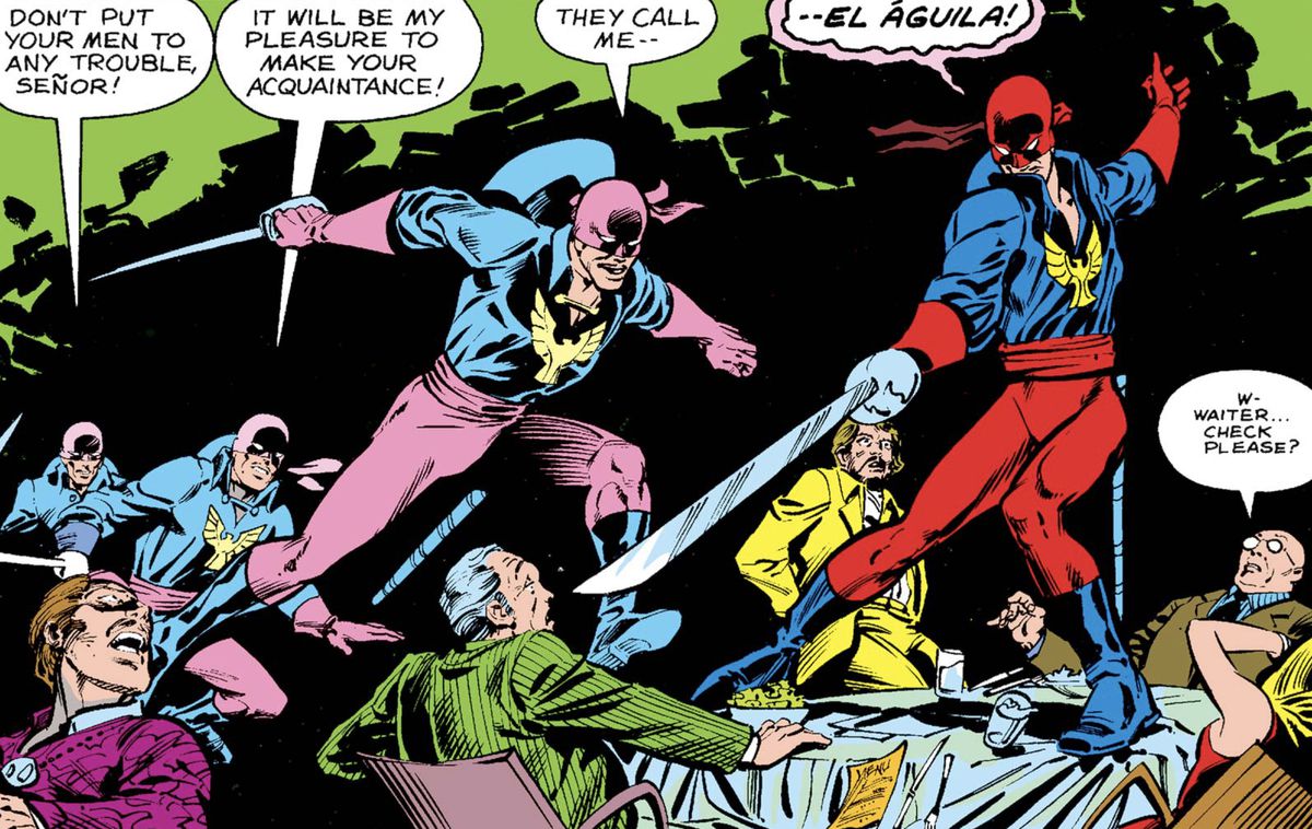El Águila leaps to the top of a restaurant table, scattering the patrons sitting at it, as he announces “The call me... El Águila!” in Power Man and Iron Fist #58 (1979).