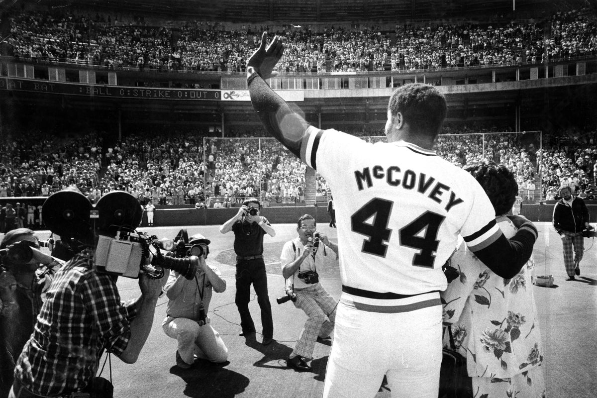 Sept. 18, 1977: Giants first baseman Willie McCovey waves to fans as he’s honored at Candlestick Park in 1977. His arm is around his mother Esther’s shoulder.