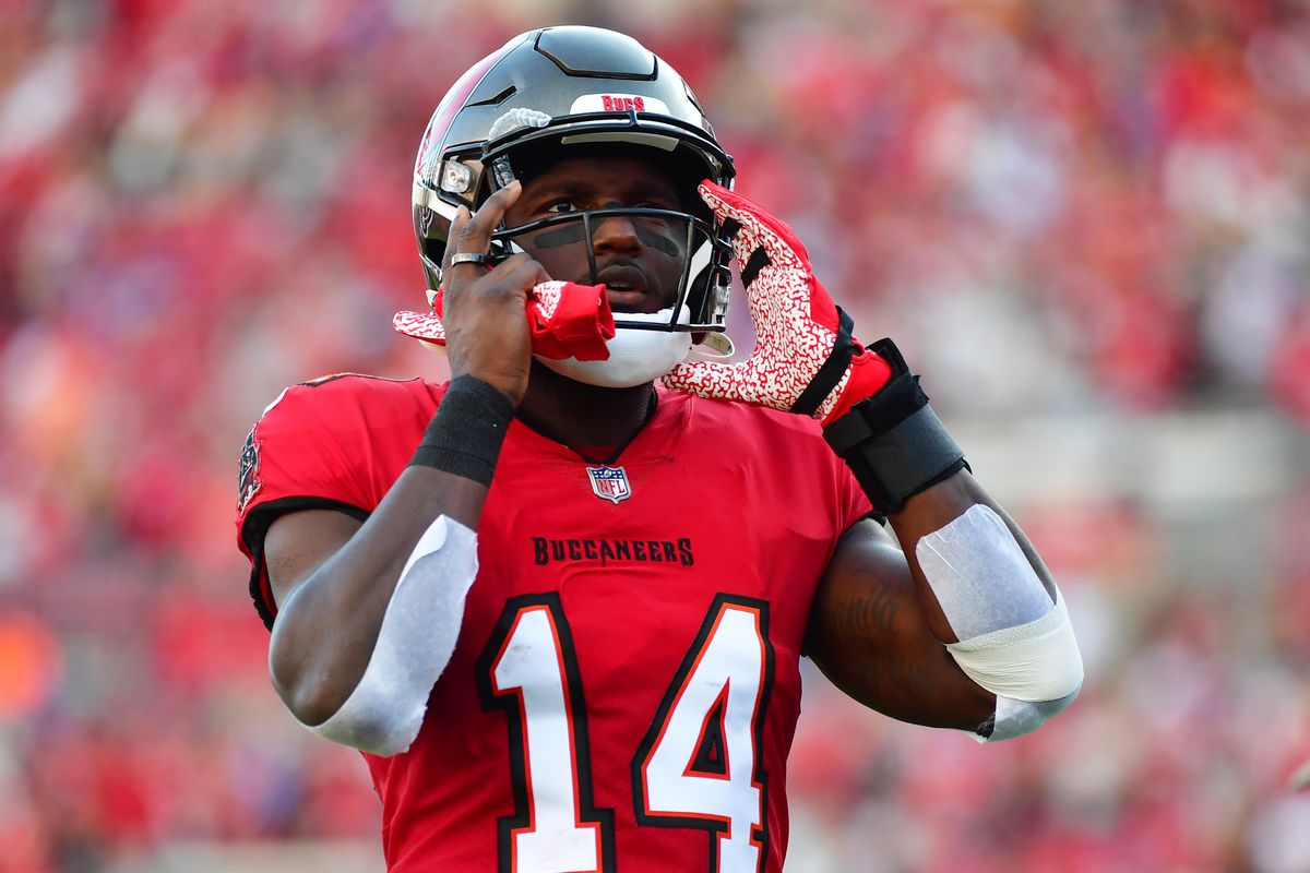 Chris Godwin #14 of the Tampa Bay Buccaneers adjusts his helmet prior to a game against the Buffalo Bills at Raymond James Stadium on December 12, 2021 in Tampa, Florida.