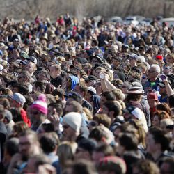Crowds cheer as Democratic presidential candidate and Vermont Sen. Bernie Sanders gives a speech to supporters at This is the Place Heritage Park in Salt Lake City, Friday, March 18, 2016.