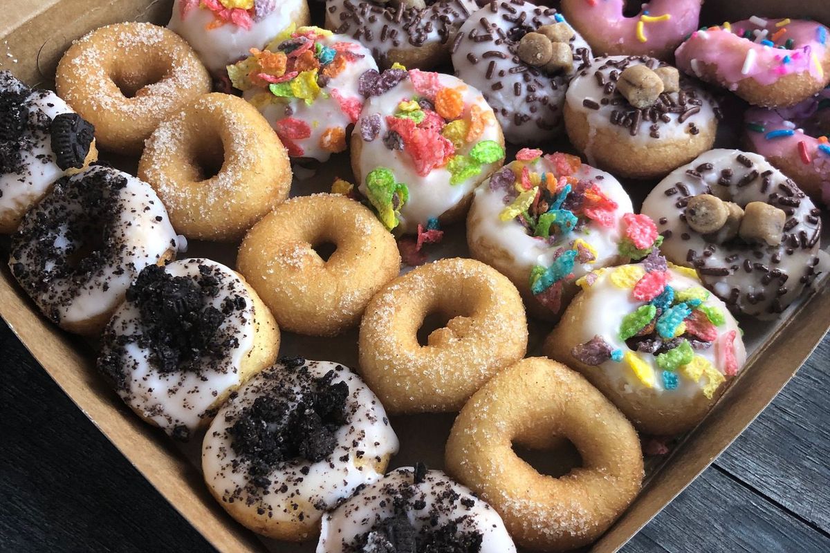 A box if tiny, colorful doughnuts.