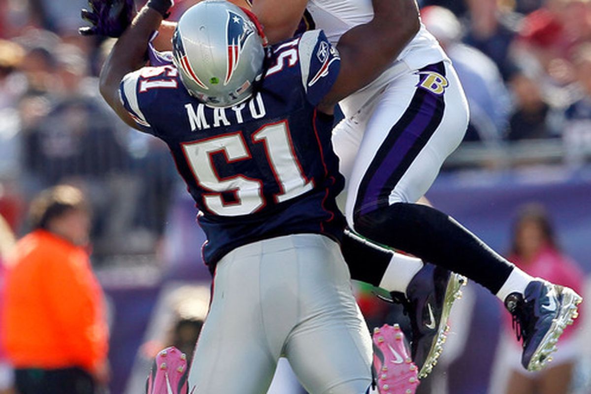 <em>Jerod Mayo makes one of the 18 tackles he had Sunday (61 total).  Todd Heap was abused all day long</em>.