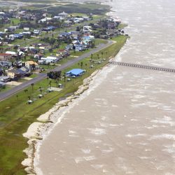 In this aerial photo, waves crash in the wake of Hurricane Harvey, Monday, Aug. 28, 2017, in Corpus Christi, Texas. Harvey hit the coast as a Category 4 hurricane.