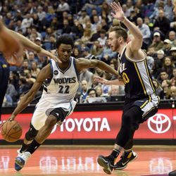 Minnesota Timberwolves’ Andrew Wiggins (22) drives against Utah Jazz’s Gordon Hayward (20) during the fourth quarter of an NBA basketball game on Saturday, March 26, 2016, in Minneapolis. (AP Photo/Hannah Foslien)