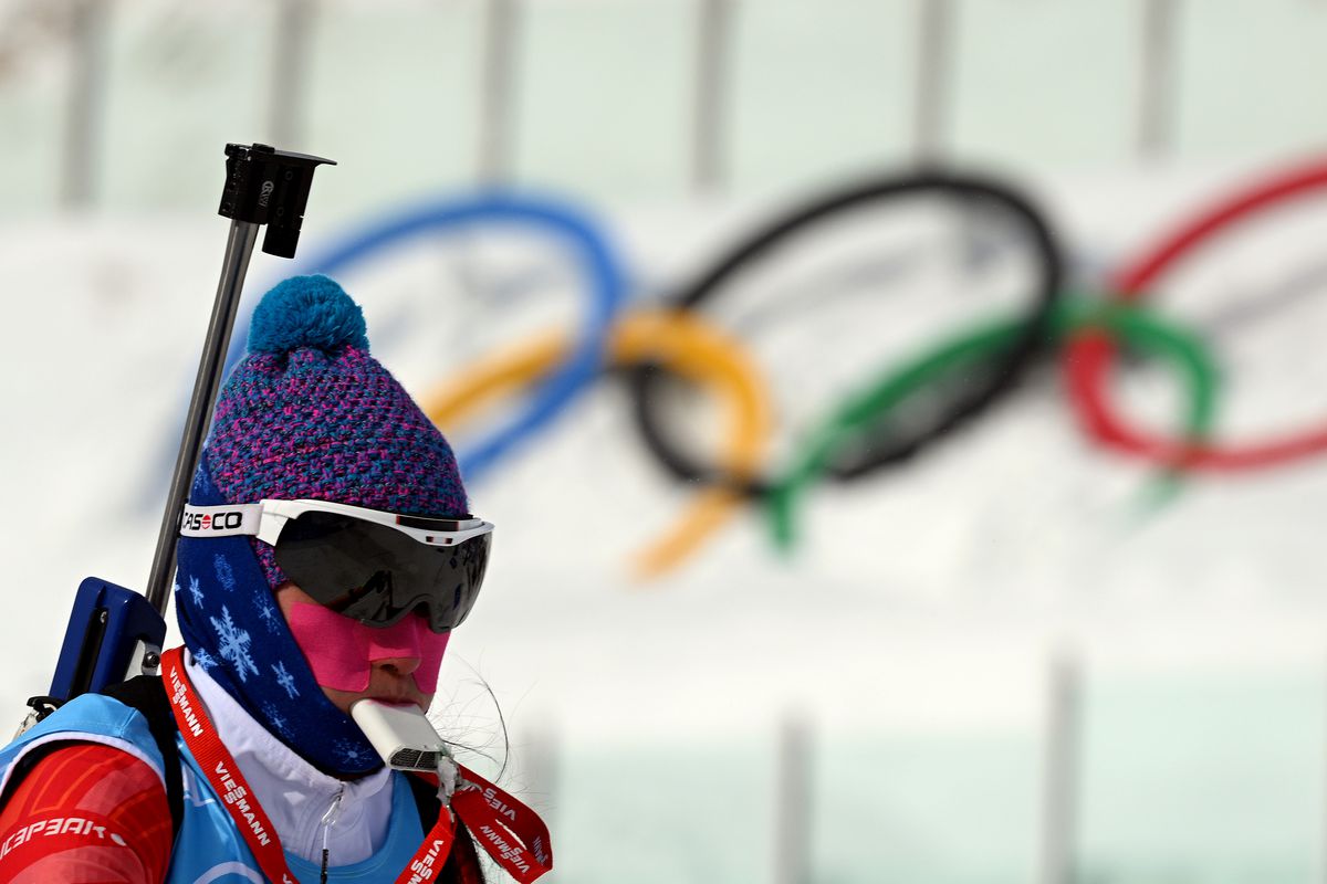 An athlete of China Republic protects from wind and cold during the Biathlon Training Session at National Biathlon Centre ahead of Beijing 2022 Winter Olympic Games on January 31, 2022 in Zhangjiakou, China.