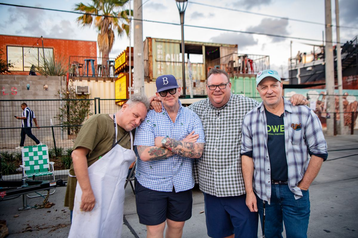 Chef Chris Bianco, pitmaster Billy Durney, Southern Smoke Festival founder Chris Shepherd, and chef Tom Colicchio pose for a picture.