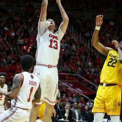 Utah Utes forward David Collette (13) puts the ball in during the game against the California Golden Bears at the Huntsman Center in Salt Lake City on Saturday, Feb. 10, 2018.