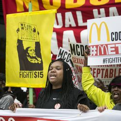 McDonald’s employees’ supporters protest outside the company’s headquarters in the West Loop Monday. | Ashlee Rezin/Sun-Times