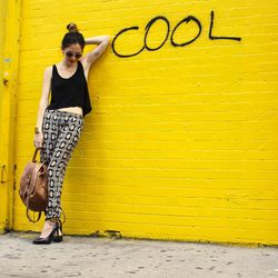  Sara of <a href="http://fancyhipster.com"target="_blank">Fancy Hipster</a> is wearing a Brandy Melville top, Myne pants, Saint Laurent heels and a <a href="http://www1.macys.com/shop/product/patricia-nash-handbag-vasto-oil-rub-backpack?ID=770949&PartnerI
