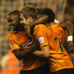 WOLVERHAMPTON, ENGLAND - OCTOBER 23: Kevin Doyle (R) of Wolves celebrates with team mate Sylvan Ebanks-Blake after scoring his second goal during the npower Championship match between Wolverhampton Wanderers and Bolton Wanderers at Molineux on October 23,