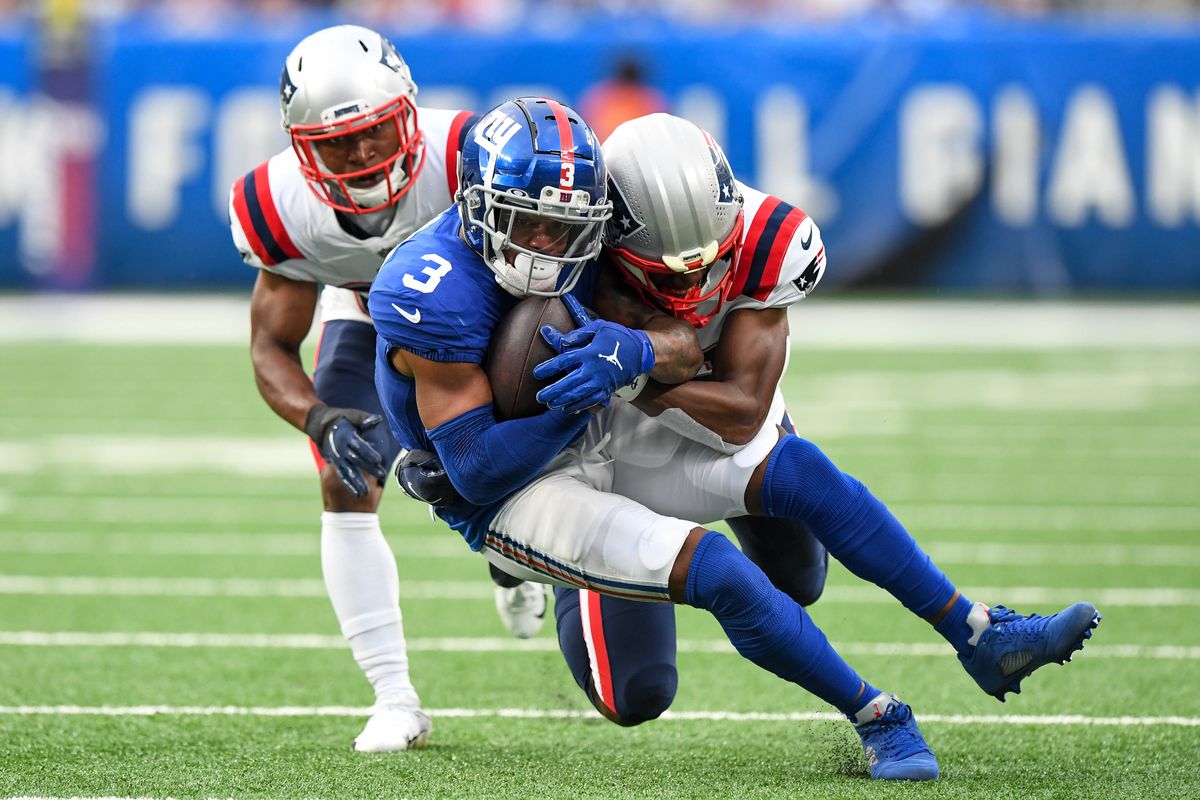 New England Patriots cornerback Mike Jackson (35) makes a tackles on New York Giants wide receiver Sterling Shepard (3) during the second quarte at MetLife Stadium.&nbsp;