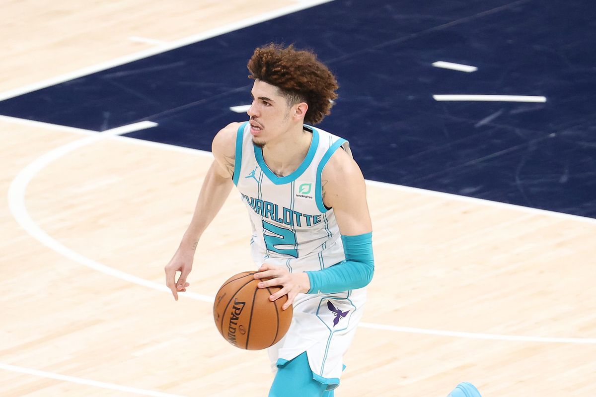 LaMelo Ball of the Charlotte Hornets dribbles the ball against the Indiana Pacers during the 2021 NBA Play-In Tournament at Bankers Life Fieldhouse on May 18, 2021 in Indianapolis, Indiana.