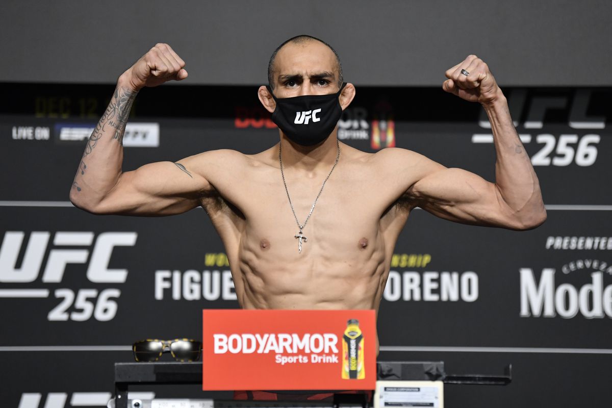 Tony Ferguson poses on the scale during the UFC 256 weigh-in at UFC APEX on December 11, 2020 in Las Vegas, Nevada.