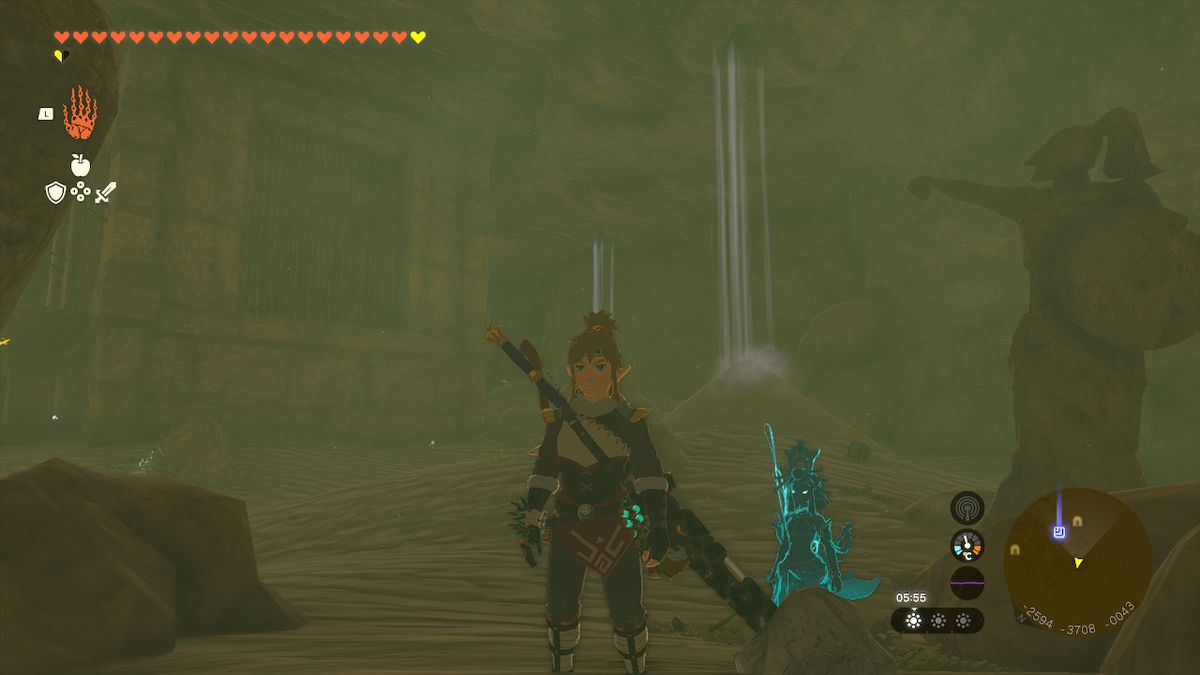 Link stands in a cave while searching for the Phantom Armor in Zelda Tears of the Kingdom.