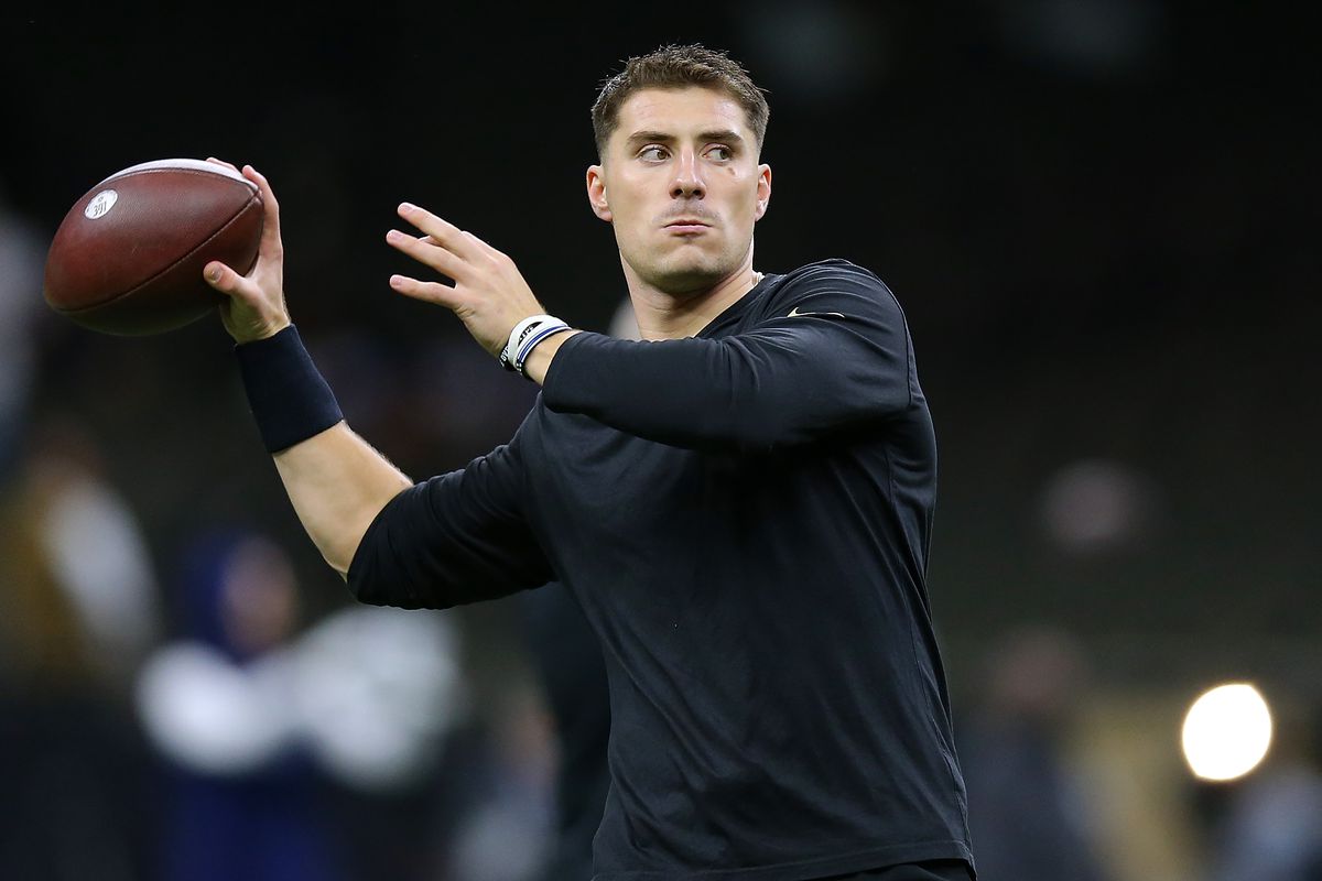 Ian Book #16 of the New Orleans Saints warms up before a game against the Dallas Cowboys at the the Caesars Superdome on December 02, 2021 in New Orleans, Louisiana.