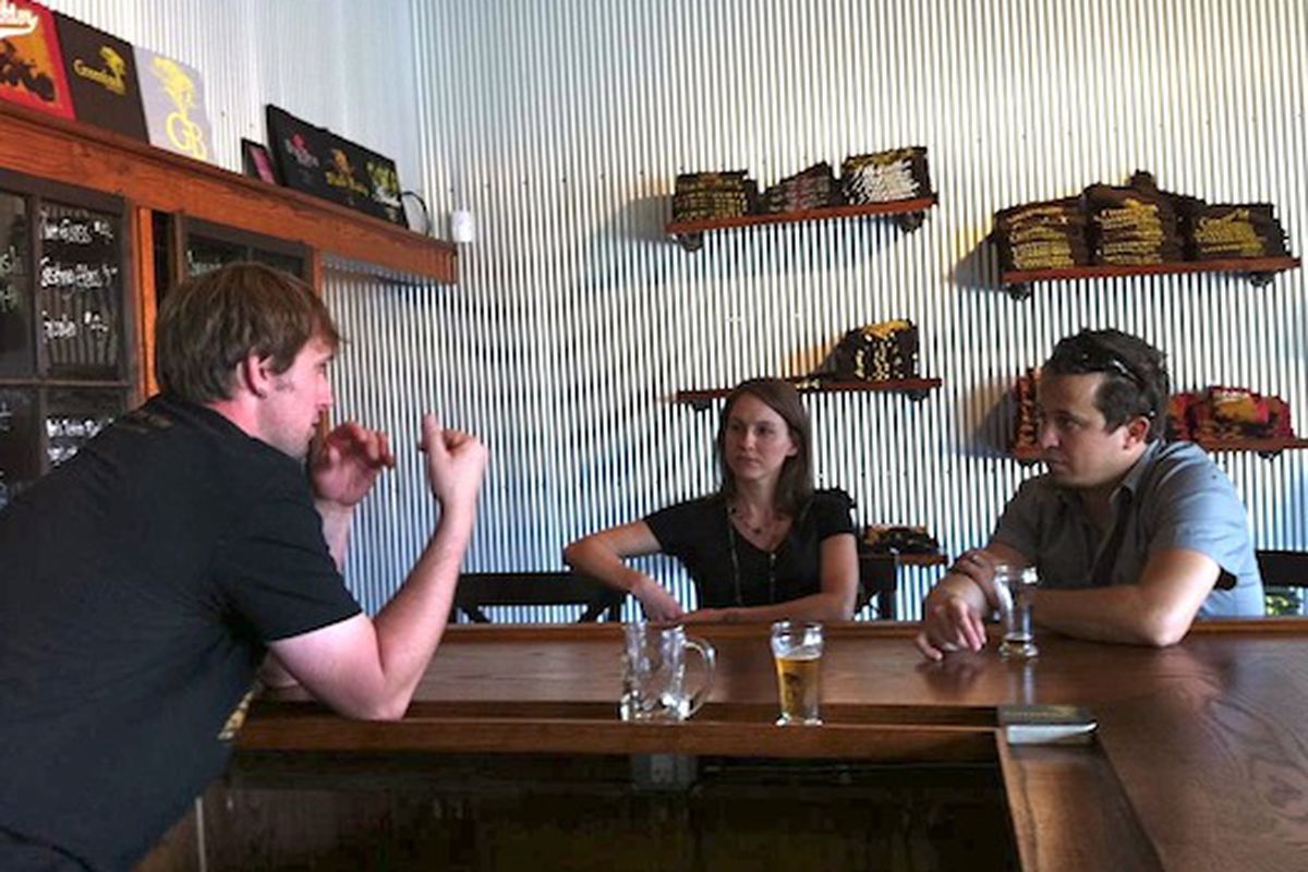 Danny Grant and his wife talking beer with Scott Sullivan of Greenbush 