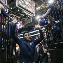 Utah Jazz guard Donovan Mitchell (45) leaves the court after the Jazz won 119-79 over the Golden State Warriors at Vivint Arena in Salt Lake City on Tuesday, April 10, 2018.