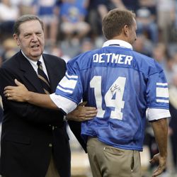Elder Jeffrey Holland greets Ty Detmer  in Provo, Utah, Saturday, Sept. 4, 2010.  Detmer was among the BYU All-American quarterbacks that were honored at halftime.