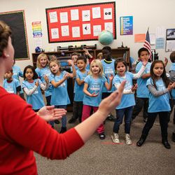 Second-graders sing before a press conference for the Our Schools Now campaign at Washington Elementary School in Salt Lake City on Tuesday, Nov. 29, 2016. The Our Schools Now campaign announced its support for an income tax increase to help fund education in the state.