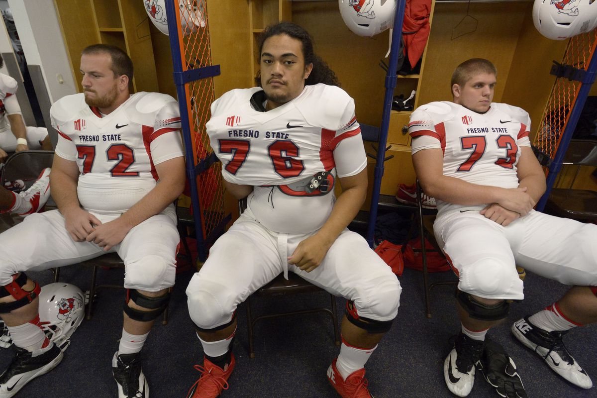Cody Wichmann (73, at right) has quietly become one of the best offensive linemen in the Mountain West.