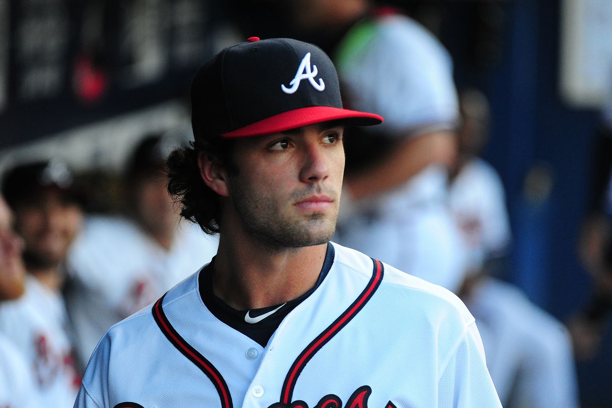 Dansby Swanson looks on from the dugout