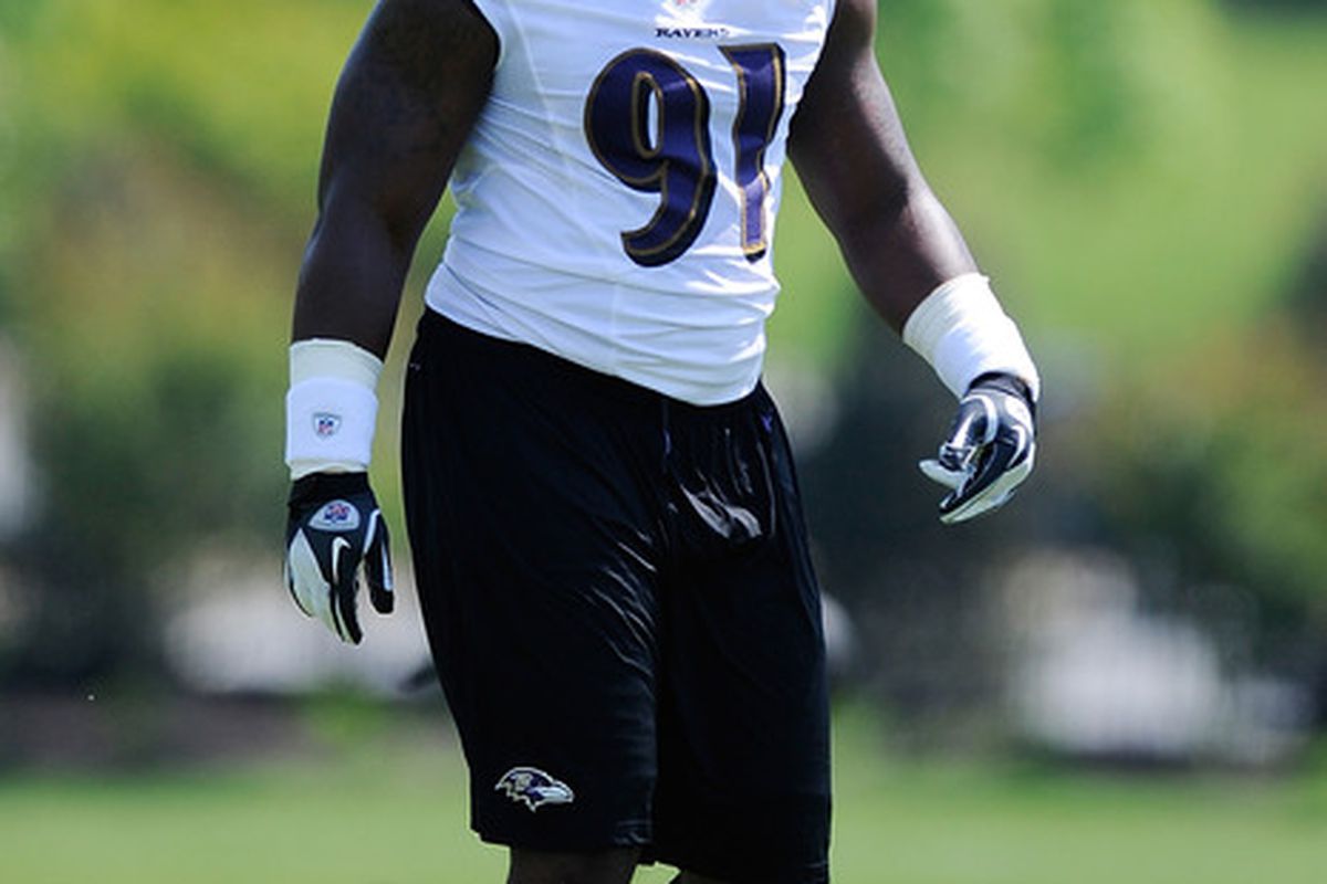 OWINGS MILLS, MD - MAY 13:  Courtney Upshaw #91 of the Baltimore Ravens takes part in a practice during the Baltimore Ravens minicamp on May 13, 2012 in Owings Mills, Maryland.  (Photo by Patrick McDermott/Getty Images)