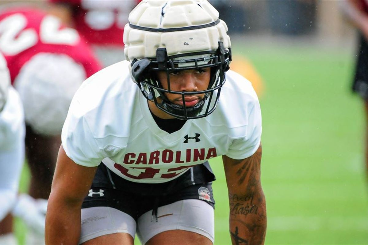 South Carolina LB Kolbe Fields lined up in practice with a padded cap over his helmet