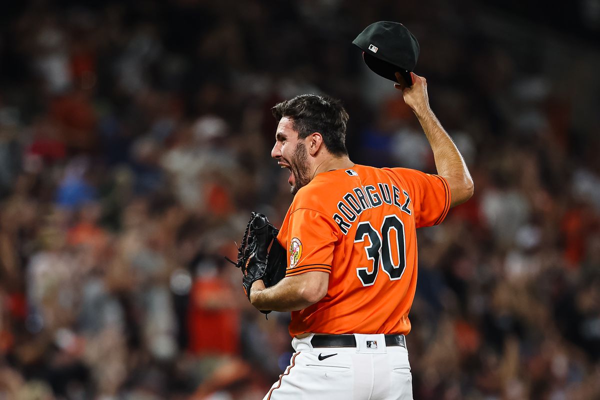 Grayson Rodriguez of the Baltimore Orioles celebrates after the final out of the seventh inning against the Tampa Bay Rays at Oriole Park at Camden Yards on September 16, 2023 in Baltimore, Maryland.