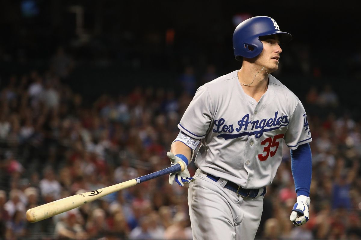 Cody Bellinger drops his bat after hitting a home run