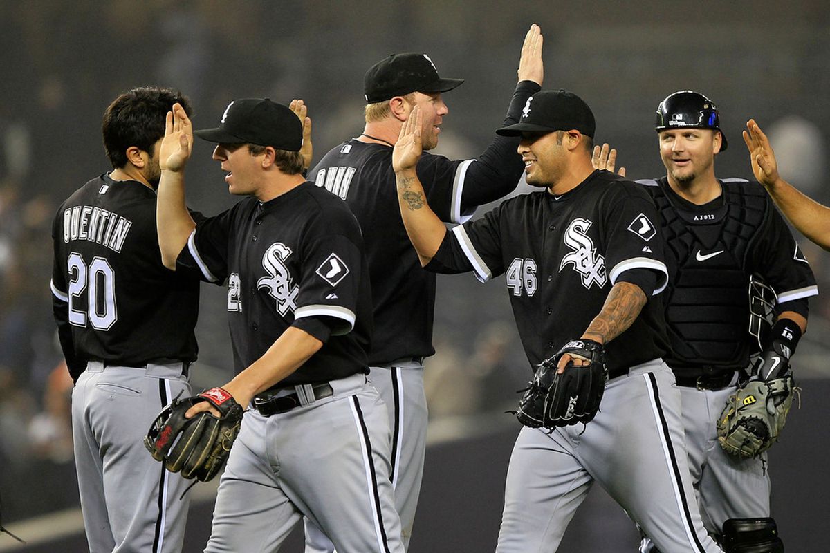 NEW YORK, NY - APRIL 25: Sergio Santos #46 of the Chicago White Sox celebrates his save with his teammates against the New York Yankees at Yankee Stadium on April 25, 2011 in the Bronx borough of New York City.  (Photo by Chris Trotman/Getty Images)