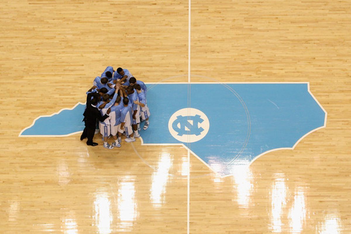CHAPEL HILL, NC - MARCH 05:  The North Carolina Tar Heels huddle before their game against the Duke Blue Devils at the Dean E. Smith Center on March 5, 2011 in Chapel Hill, North Carolina.  (Photo by Streeter Lecka/Getty Images)