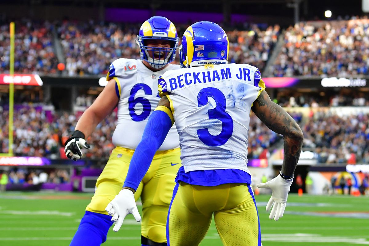Los Angeles Rams’ Odell Beckham Jr. celebrates with a teammate after scoring a touchdown during Super Bowl LVI between the Los Angeles Rams and the Cincinnati Bengals at SoFi Stadium in Inglewood, California, on February 13, 2022.