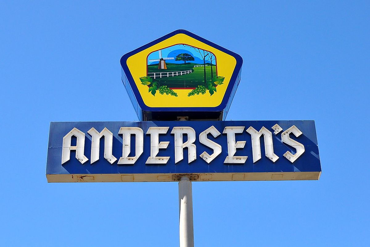 A colorful blue and yellow sign of a pea soup restaurant.