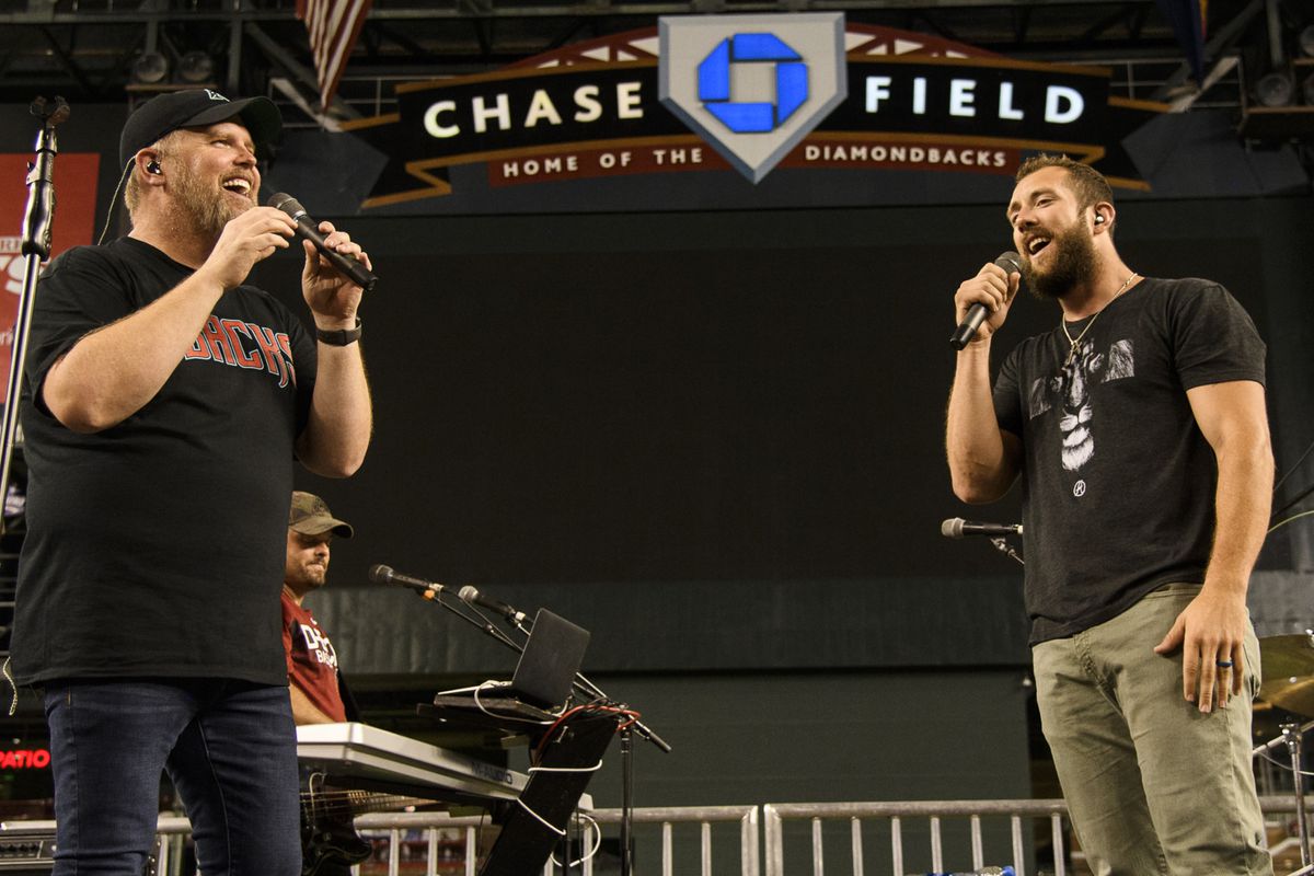 From 2018: Steven Souza Jr., right, of the Arizona Diamondbacks performs with Bart Millard of MercyMe during the Faith and Family Night postgame concert at Chase Field.