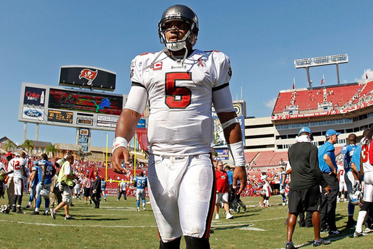 TAMPA, FL - SEPTEMBER 11:  Josh Freeman #5 of the Tampa Bay Buccaneers walks off the field after the season opener against the Detroit Lions at Raymond James Stadium on September 11, 2011 in Tampa, Florida.  (Photo by Mike Ehrmann/Getty Images)