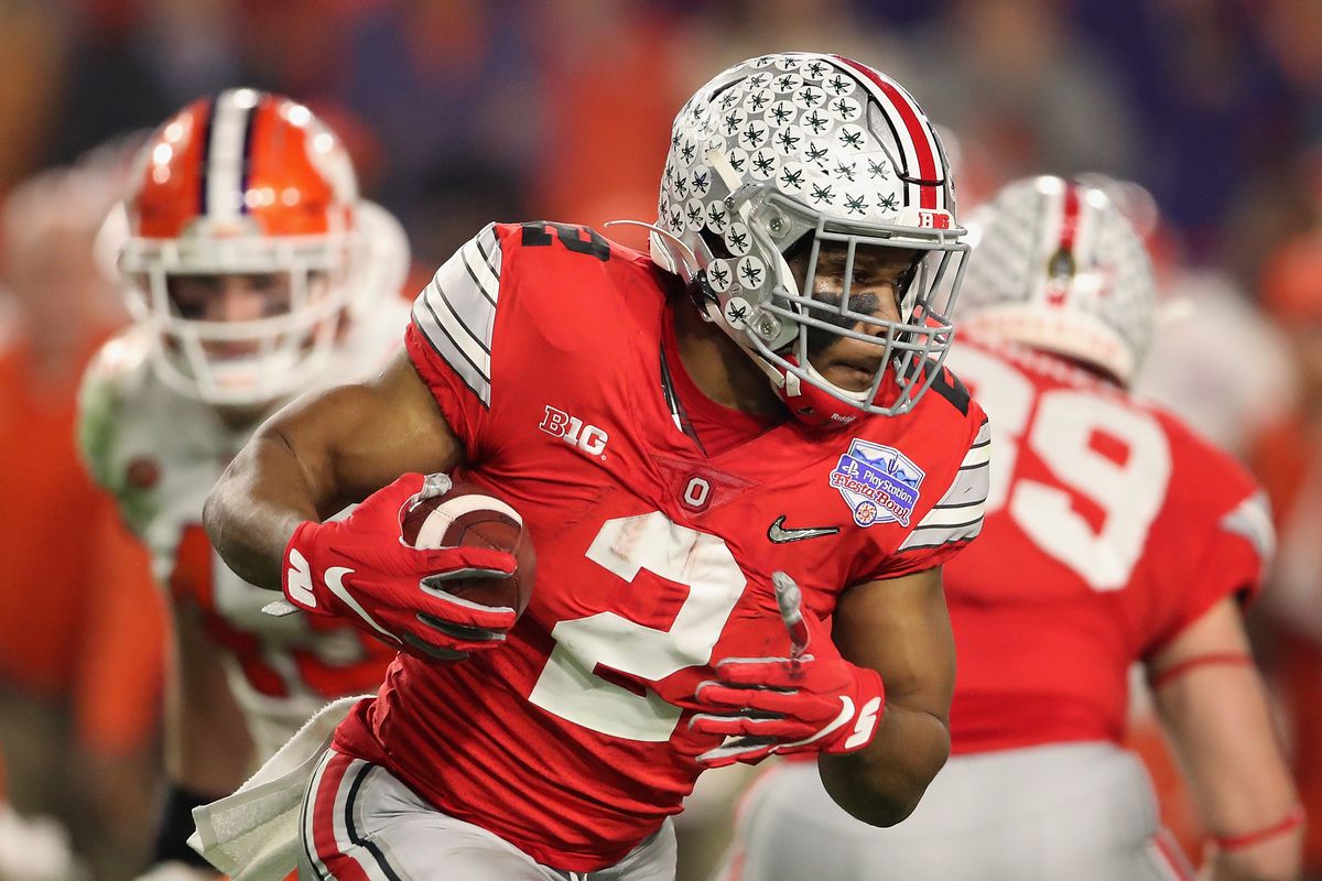 Running back J.K. Dobbins #2 of the Ohio State Buckeyes rushes the football against the Clemson Tigers during the PlayStation Fiesta Bowl at State Farm Stadium on December 28, 2019 in Glendale, Arizona. The Tigers defeated the Buckeyes 29-23.