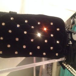 Juicy Couture velvet quilted clutch, $20