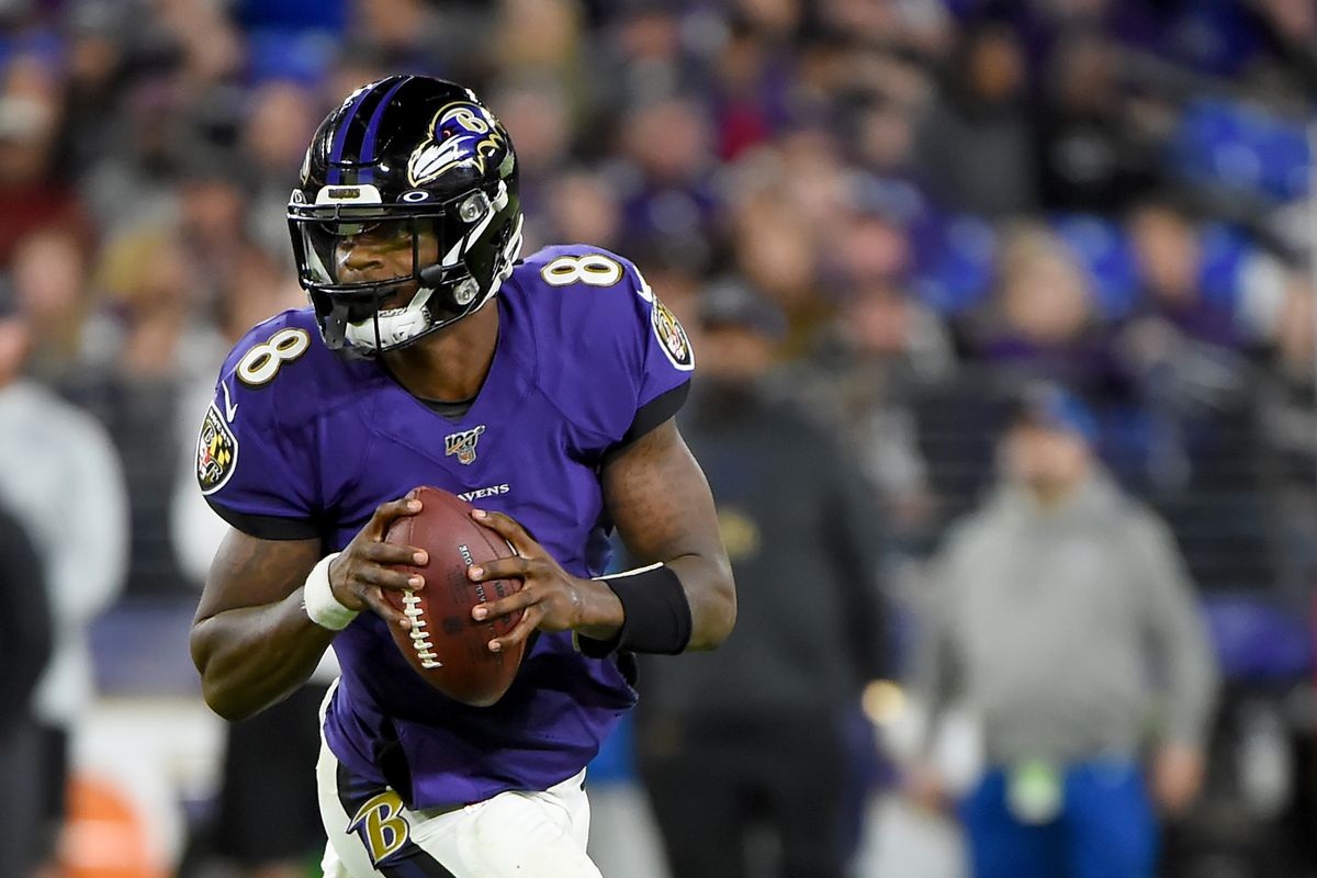 &nbsp;Lamar Jackson #8 of the Baltimore Ravens looks to pass against the Tennessee Titans during the AFC Divisional Playoff game at M&amp;T Bank Stadium on January 11, 2020 in Baltimore, Maryland.