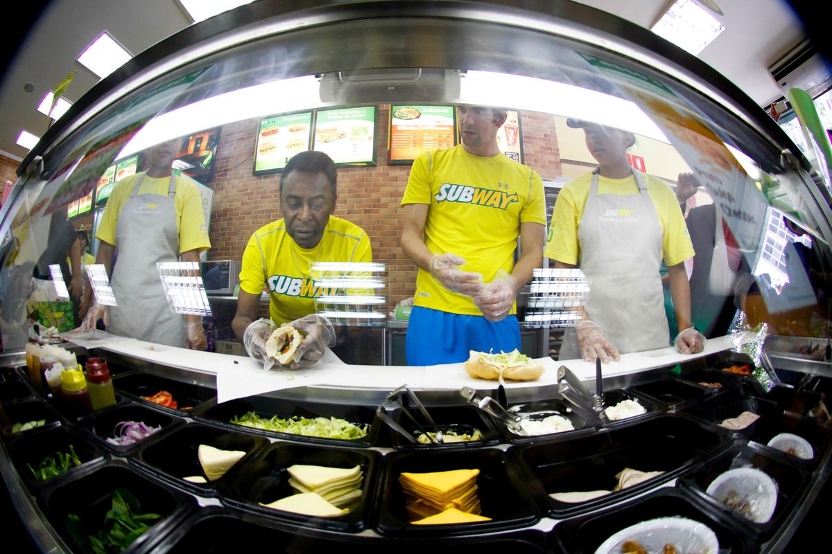 Pelé and Michael Phelps make sandwiches. I am jealous of Subway patrons.