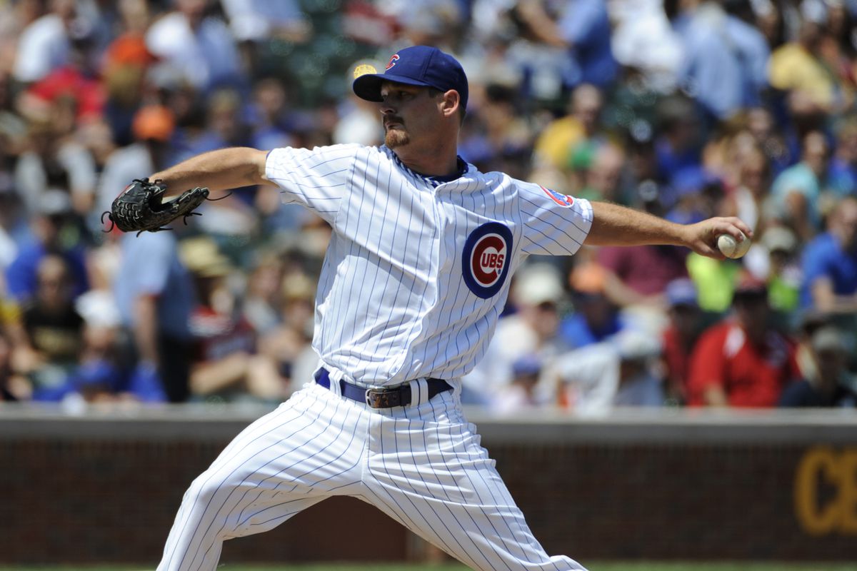 CHICAGO, IL - AUGUST 01: Travis Wood #30 of the Chicago Cubs pitches against the Pittsburgh Pirates in the first inning on August 1, 2012 at Wrigley Field in Chicago, Illinois.  (Photo by David Banks/Getty Images)