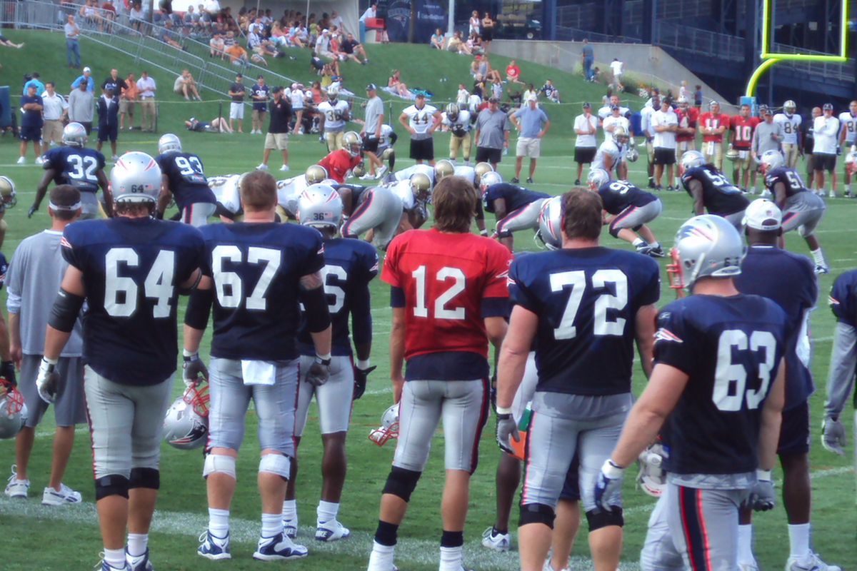 Tom Brady and his linemen watch the Pats defense against Drew Brees.  <em>Photo credit to my daughter Grace</em>.