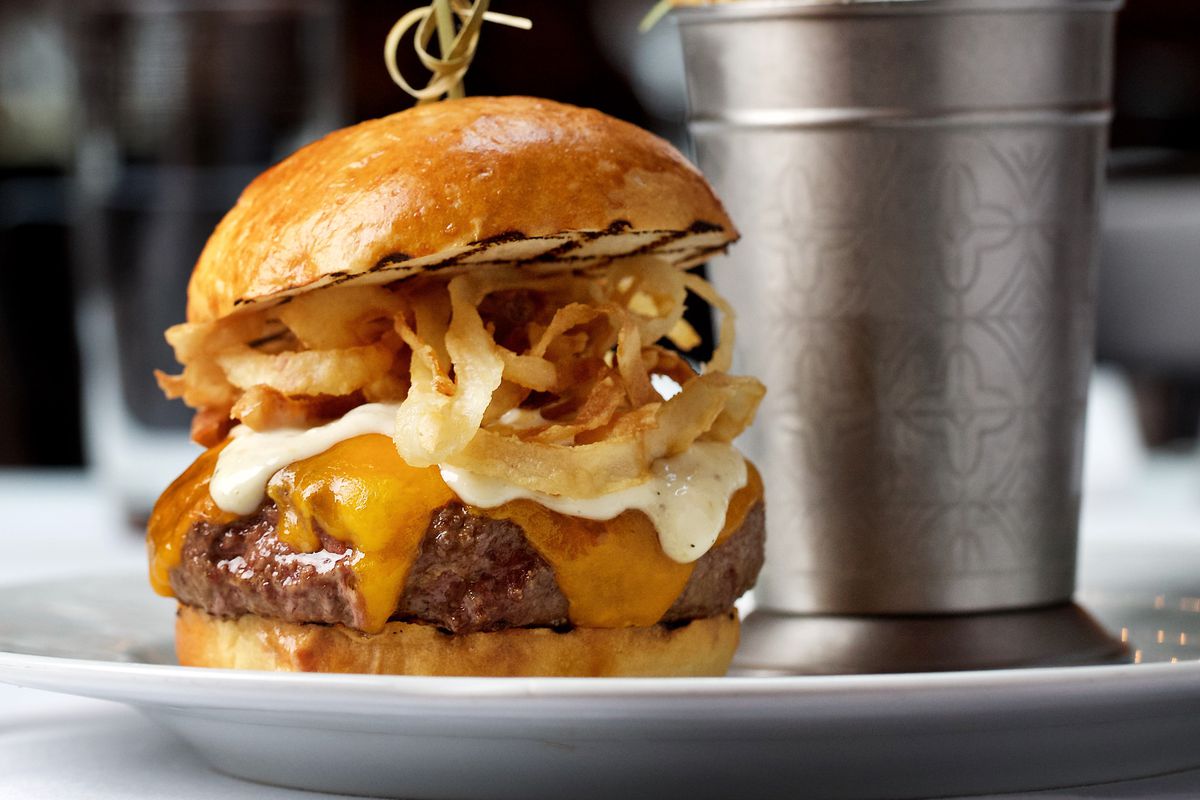 A Schlow Burger with cheddar, horseradish, and crispy onions from the Riggsby