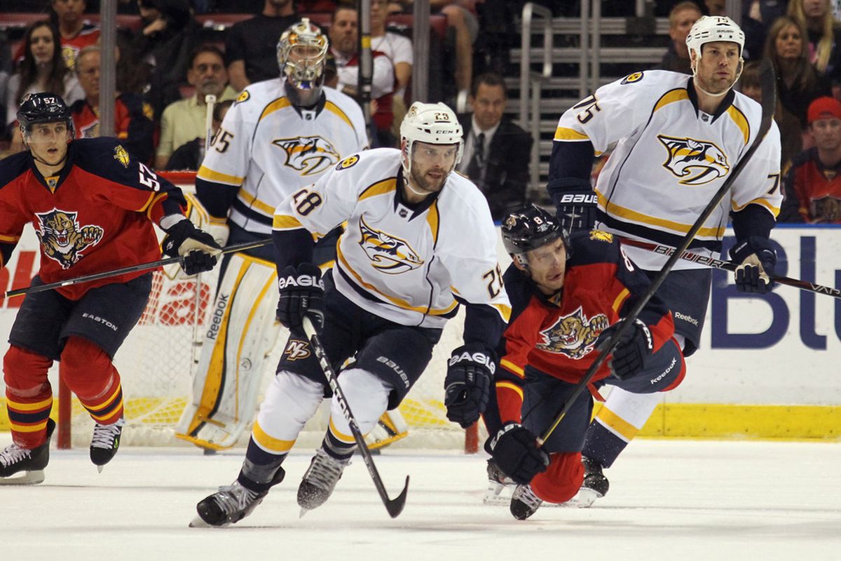 Paul Gaustad (center) and Hal Gill (right) give the Predators enviable size and strength.