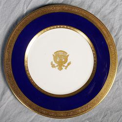 A Woodrow Wilson plate. Set Momjian, a collector of White House china, has put the china on display at the O.C. Tanner store until Feb. 28.