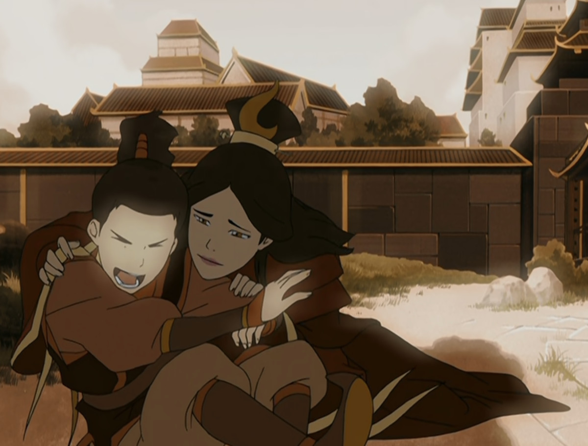 A still from the Avatar: The Last Airbender animated tv series showing a memory of Zuko as a child. He sits by a pond with his mom and she holds him as he laughs. 