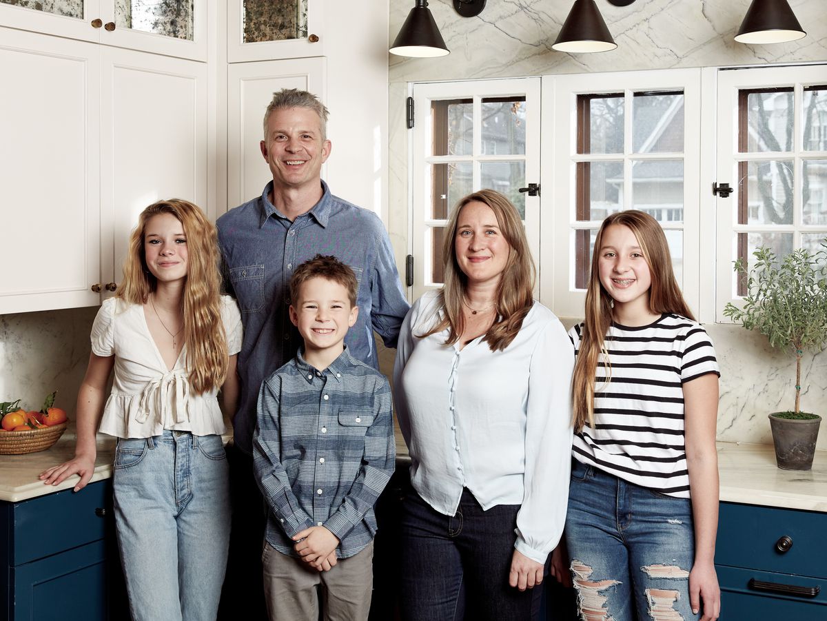 Chad and Rachel Alcorn, and their children, (from left) Charlotte,  Soren, and Mira, lived with the existing kitchen for six years before tackling the renovation. 