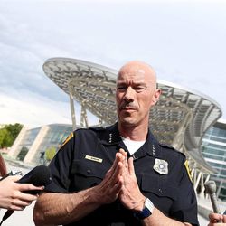 Former Salt Lake City Police Chief Chris Burbank speaks to the media about his resignation near the Public Safety Building in Salt Lake City on Thursday, June 11, 2015. 