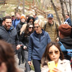 Sen. Elizabeth Warren, D-Mass., walks with Carl Fisher, of Save Our Canyons, and member of the media at Storm Mountain picnic area in Big Cottonwood Canyon on Wednesday, April 17, 2019.