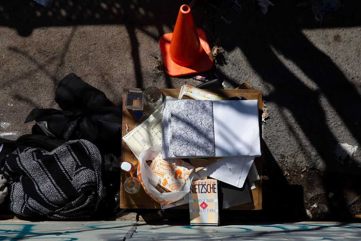 A homeless encampment on the side of the Manhattan Bridge in Chinatown. 
